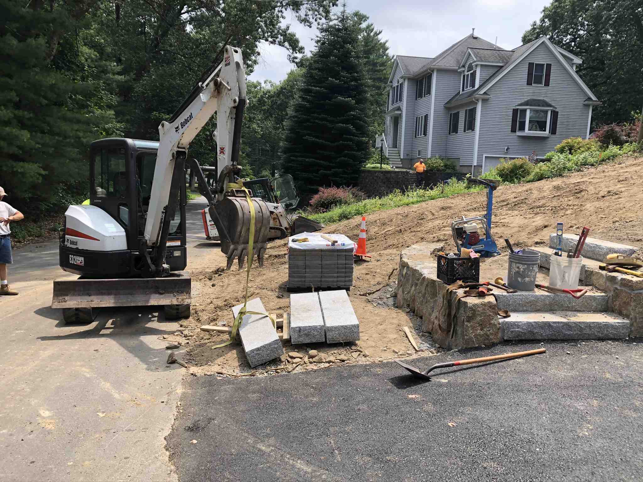marked-out area being excavated - installing patio pavers